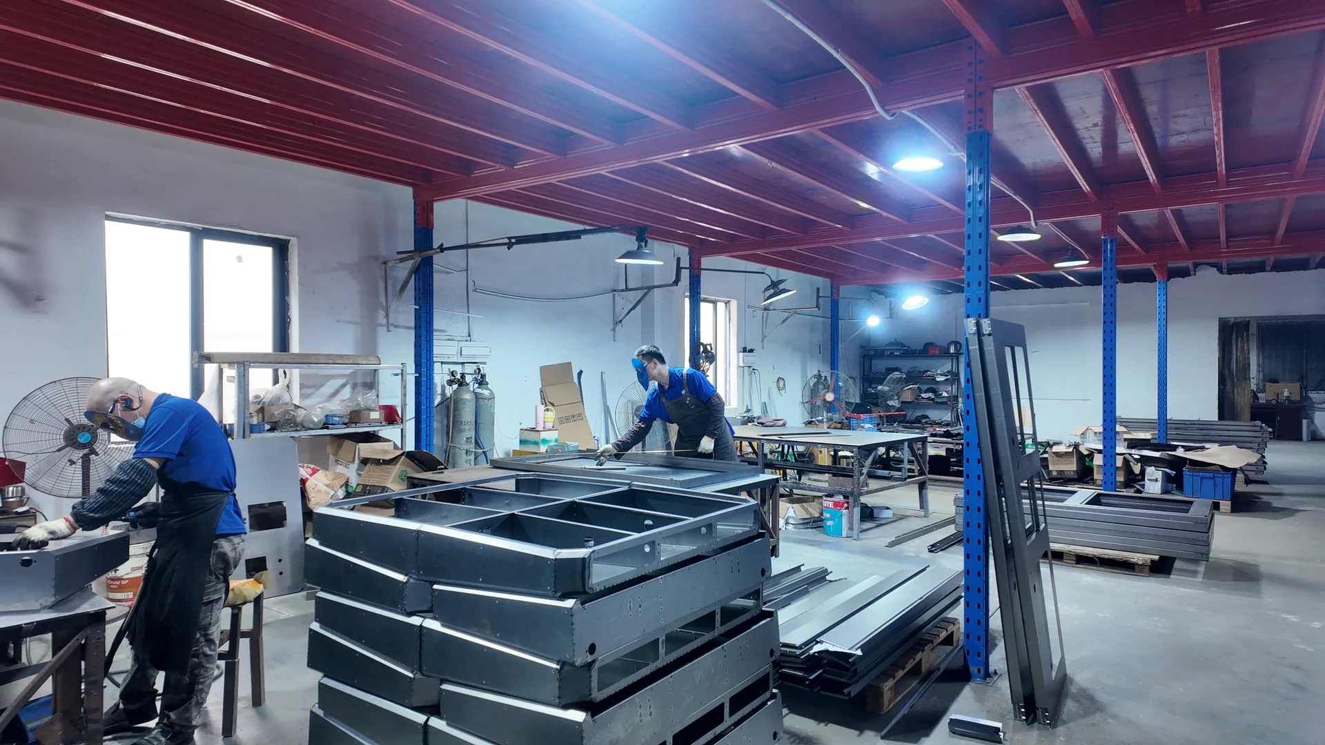 Joypark factory team preparing arcade equipment components